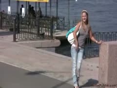 Sensual blonde Olga pees her panties on the embankment 